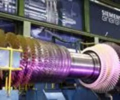 Siemens Energy hebt Ziele an und zahlt Dividende