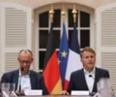 Merz und Macron weisen US-Zolldrohung wegen Digitalmarkt-Regulierung zurück