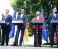 Koalition stemmt umfassendes Reformpaket - Gemischtes Echo