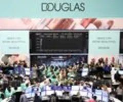 Parfümeriekette Douglas kürzt Prognosen erneut