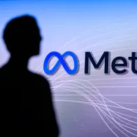 Eine Silhouette vor dem Logo von Meta.