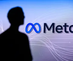 Eine Silhouette vor dem Logo von Meta.